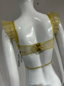 Latex bra with underwire, bow detail, and ruffled straps.
